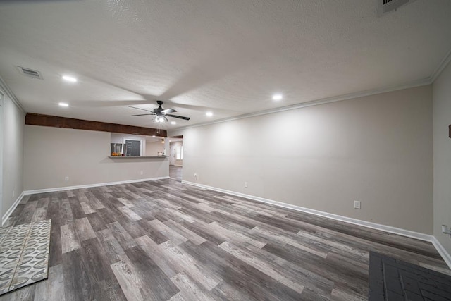 unfurnished living room with hardwood / wood-style flooring, ceiling fan, ornamental molding, and a textured ceiling