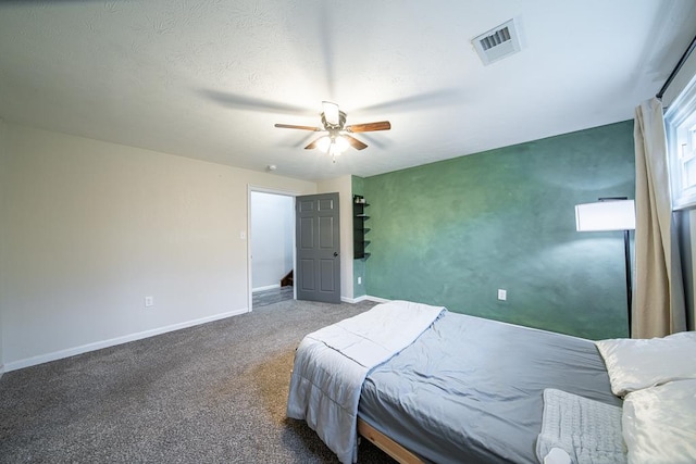 bedroom featuring ceiling fan and carpet floors