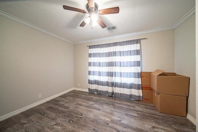 unfurnished room with dark hardwood / wood-style floors, ceiling fan, and ornamental molding