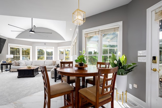 5410 River Oak Way, Phenix City, AL 36867 - dining room with a ceiling fan, healthy amount of natural light, a chandelier, and light marble finish flooring
