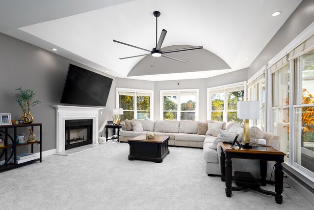 5410 River Oak Way, Phenix City, AL 36867 - living area with vaulted ceiling, recessed lighting, a ceiling fan, a fireplace, and light colored carpet