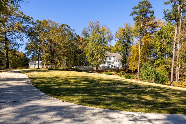 5410 River Oak Way, Phenix City, AL 36867 - view of front facade with a front yard