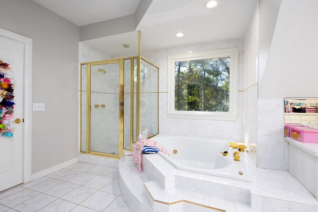 bathroom featuring plus walk in shower and tile patterned floors