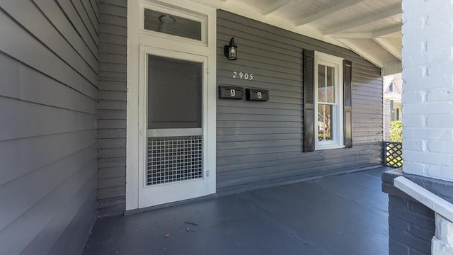 property entrance with a porch