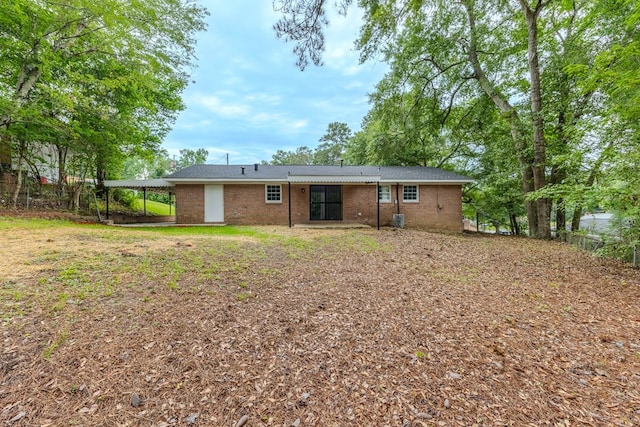 5011 Edo Ct, Columbus, GA 31907 - rear view of property with a carport and brick siding