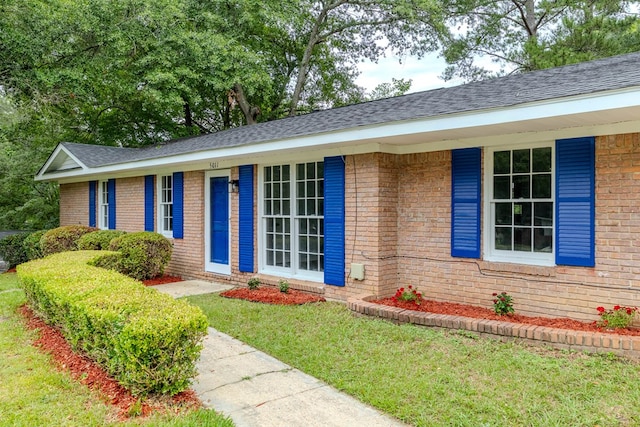 5011 Edo Ct, Columbus, GA 31907 - ranch-style house with brick siding, a front lawn, and a shingled roof