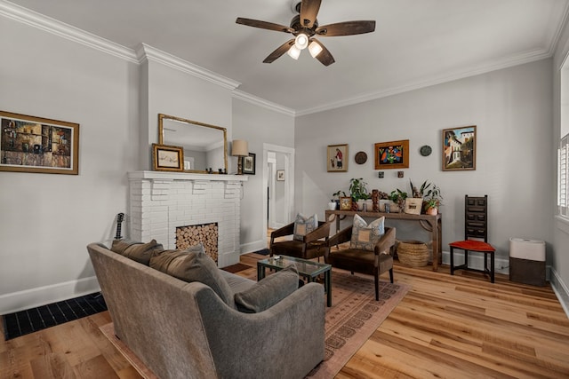 1917 Dimon St, Columbus, GA 31906 - living area featuring ceiling fan, a brick fireplace, crown molding, and light wood-style floors