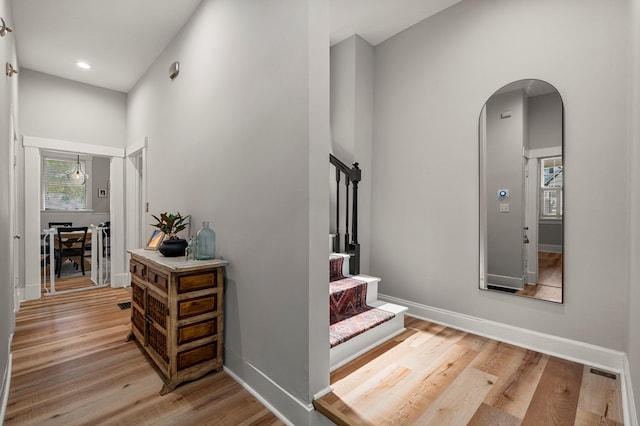 1917 Dimon St, Columbus, GA 31906 - stairs featuring arched walkways, wood finished floors, and recessed lighting