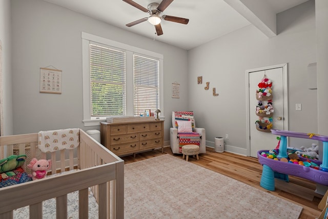 1917 Dimon St, Columbus, GA 31906 - bedroom with wood finished floors, a crib, and a ceiling fan