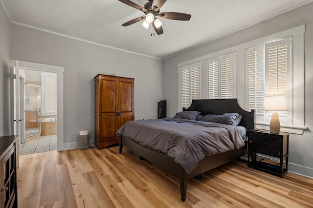 1917 Dimon St, Columbus, GA 31906 - bedroom with light wood finished floors, ornamental molding, a ceiling fan, and ensuite bathroom