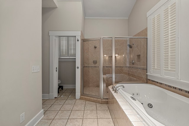 1917 Dimon St, Columbus, GA 31906 - full bathroom with a jetted tub, a shower stall, and tile patterned flooring