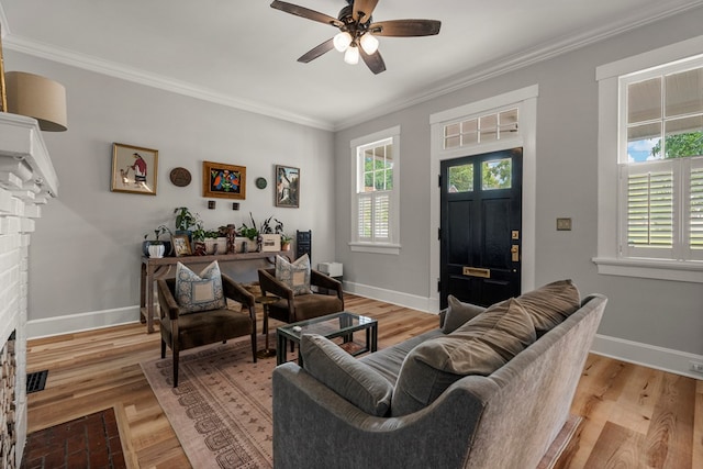 1917 Dimon St, Columbus, GA 31906 - living area with a ceiling fan, ornamental molding, and light wood-style flooring