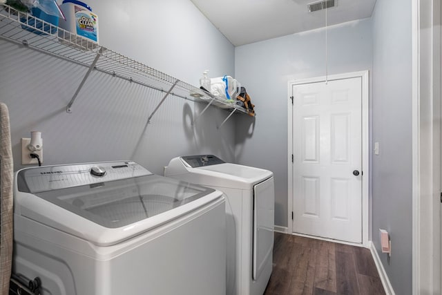 28 Red Maple Dr, Phenix City, AL 36869 - clothes washing area featuring laundry area, dark wood-style flooring, visible vents, baseboards, and washer and dryer