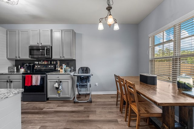 28 Red Maple Dr, Phenix City, AL 36869 - kitchen with backsplash, stainless steel appliances, gray cabinets, and dark wood-type flooring