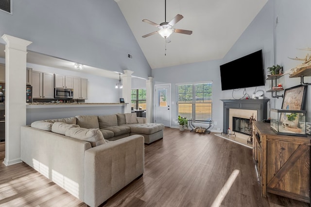 28 Red Maple Dr, Phenix City, AL 36869 - living room featuring high vaulted ceiling, decorative columns, a ceiling fan, and a premium fireplace