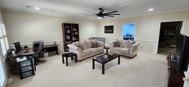 living area with crown molding, ceiling fan, light carpet, and recessed lighting