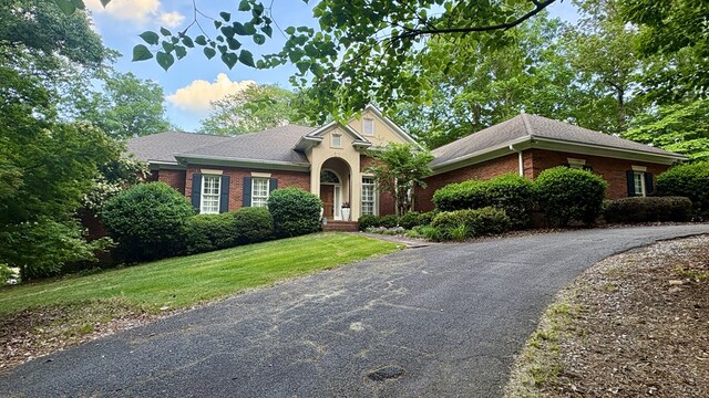 451 Sweetwater Dr, Cataula, GA 31804 - single story home featuring aphalt driveway, a front lawn, and brick siding