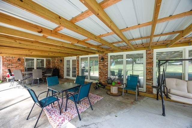 view of patio featuring french doors and outdoor dining space