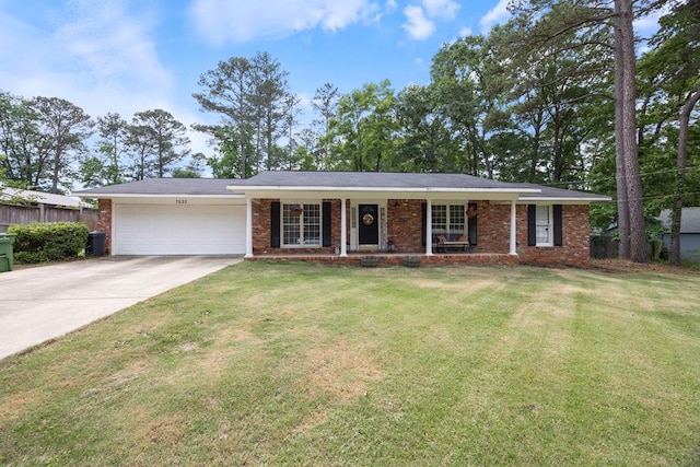 ranch-style home featuring covered porch, a front yard, brick siding, concrete driveway, and an attached garage
