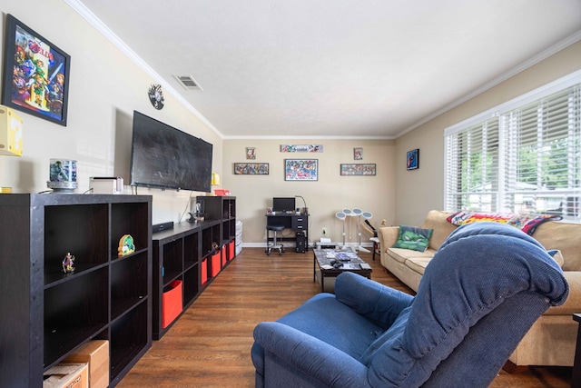 living room featuring baseboards, dark wood finished floors, ornamental molding, and visible vents