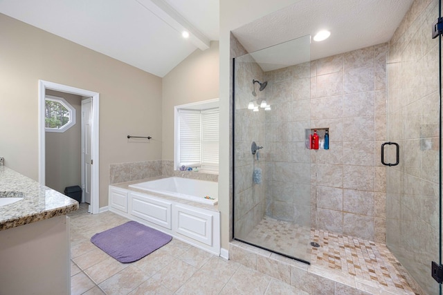 bathroom with vanity, vaulted ceiling with beams, a bath, tile patterned floors, and a shower stall