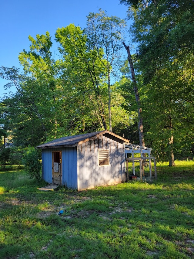 7505 Beaver Run Rd, Midland, GA 31820 - view of outdoor structure featuring a view of trees