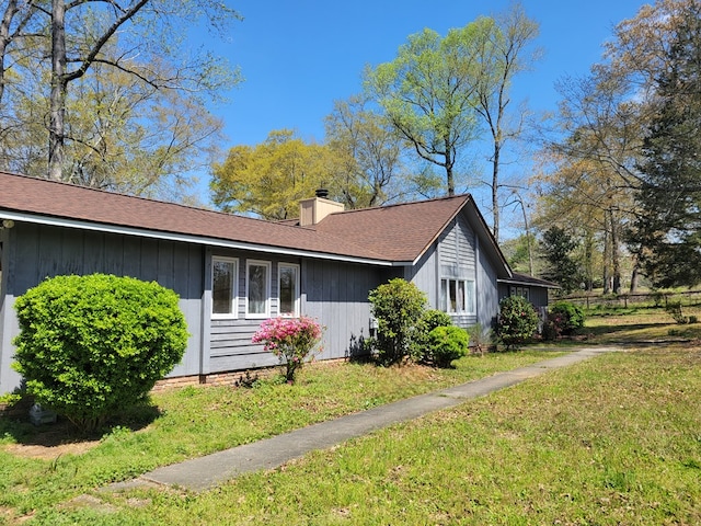 7505 Beaver Run Rd, Midland, GA 31820 - view of side of property featuring a chimney and a lawn