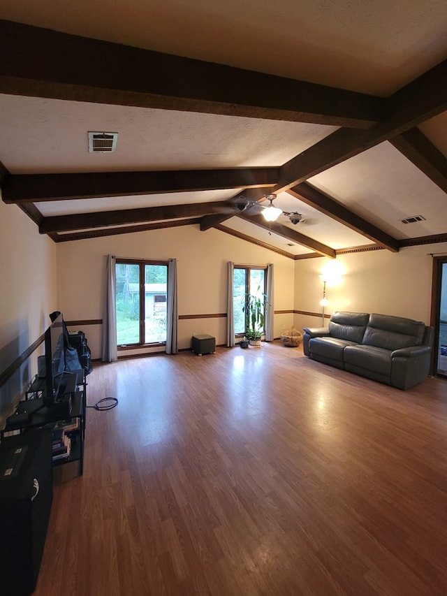 7505 Beaver Run Rd, Midland, GA 31820 - living area featuring wood finished floors, healthy amount of natural light, and a ceiling fan