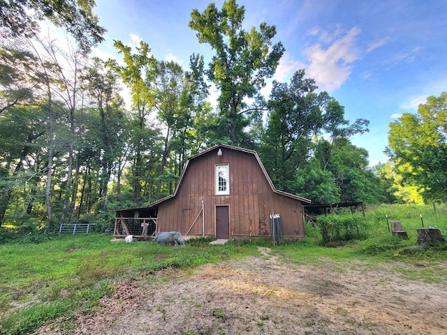 7505 Beaver Run Rd, Midland, GA 31820 - view of side of property with a barn, an outdoor structure, and a gambrel roof
