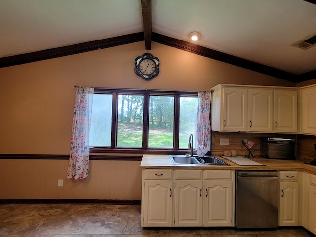7505 Beaver Run Rd, Midland, GA 31820 - kitchen with stainless steel dishwasher, white cabinetry, light countertops, and wainscoting