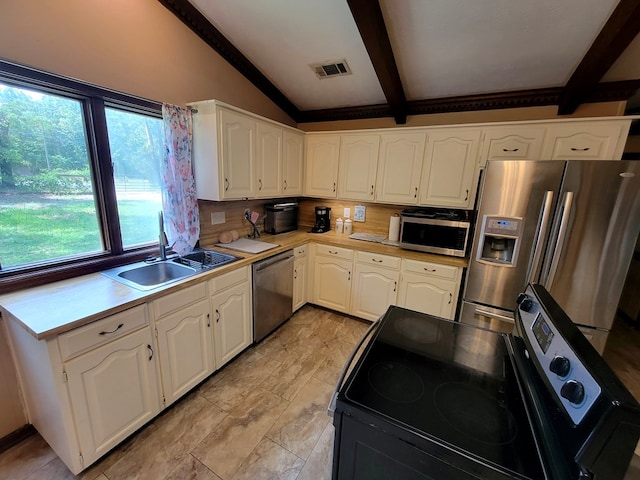 7505 Beaver Run Rd, Midland, GA 31820 - kitchen featuring stainless steel appliances, white cabinets, and light countertops