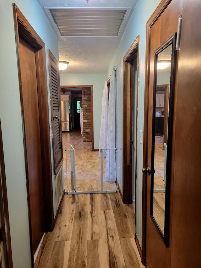 7505 Beaver Run Rd, Midland, GA 31820 - hallway featuring light wood-style flooring