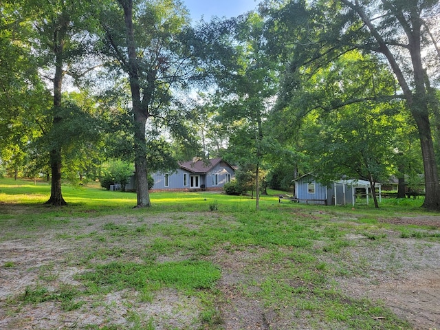 7505 Beaver Run Rd, Midland, GA 31820 - view of grassy yard featuring an outdoor structure