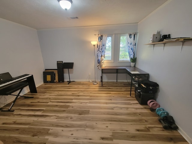 7505 Beaver Run Rd, Midland, GA 31820 - miscellaneous room with wood finished floors and ornamental molding