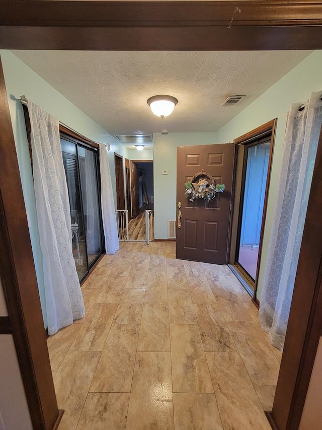 7505 Beaver Run Rd, Midland, GA 31820 - hallway with a textured ceiling