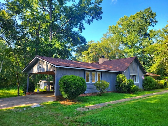 7505 Beaver Run Rd, Midland, GA 31820 - view of front of house featuring a front yard, a chimney, and driveway