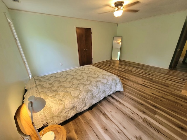 7505 Beaver Run Rd, Midland, GA 31820 - bedroom with wood finished floors and ceiling fan
