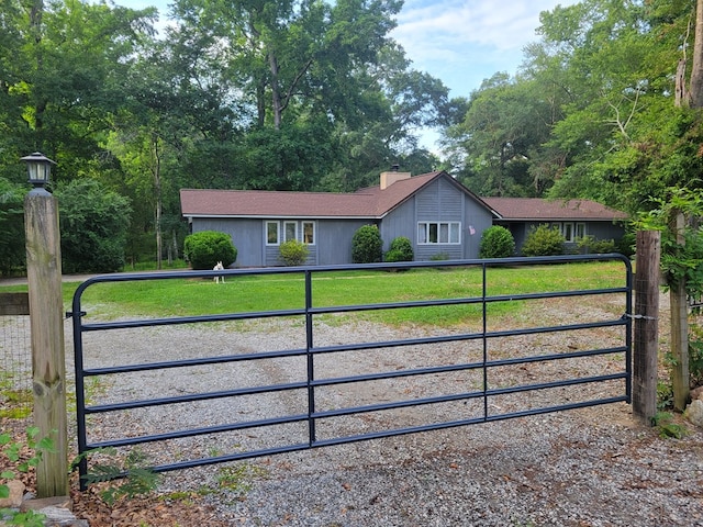 7505 Beaver Run Rd, Midland, GA 31820 - view of front of property featuring a gate, a front yard, and a chimney