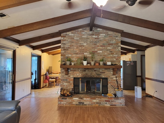 7505 Beaver Run Rd, Midland, GA 31820 - unfurnished living room with wood finished floors and a fireplace