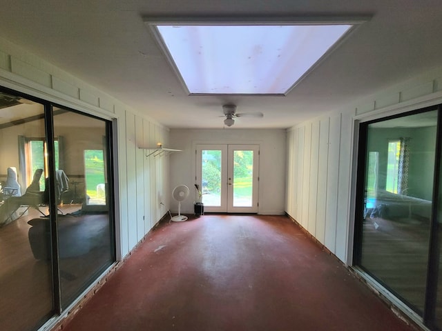 7505 Beaver Run Rd, Midland, GA 31820 - unfurnished room with a skylight, french doors, and concrete floors