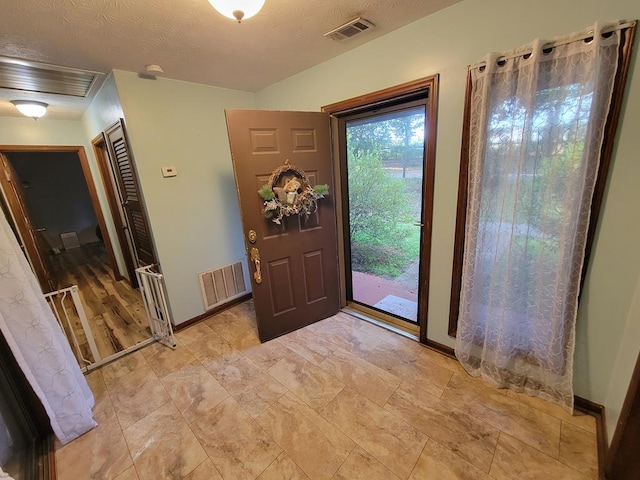 7505 Beaver Run Rd, Midland, GA 31820 - entrance foyer with baseboards and a textured ceiling