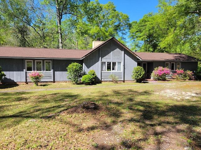 7505 Beaver Run Rd, Midland, GA 31820 - single story home with a chimney and a front yard