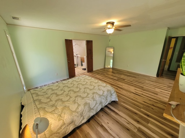 7505 Beaver Run Rd, Midland, GA 31820 - bedroom with wood finished floors and a ceiling fan