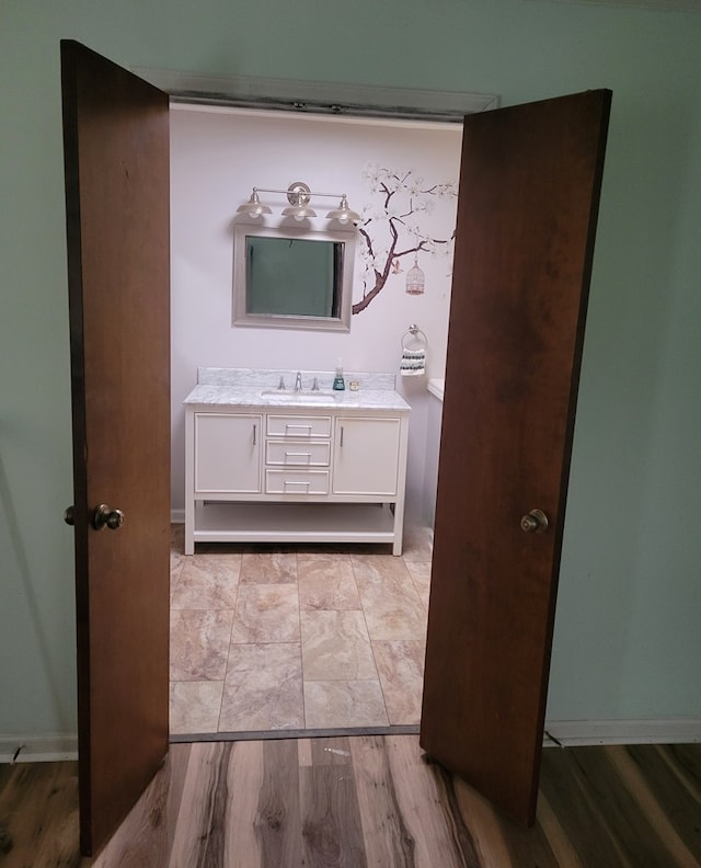7505 Beaver Run Rd, Midland, GA 31820 - bathroom featuring vanity and wood finished floors