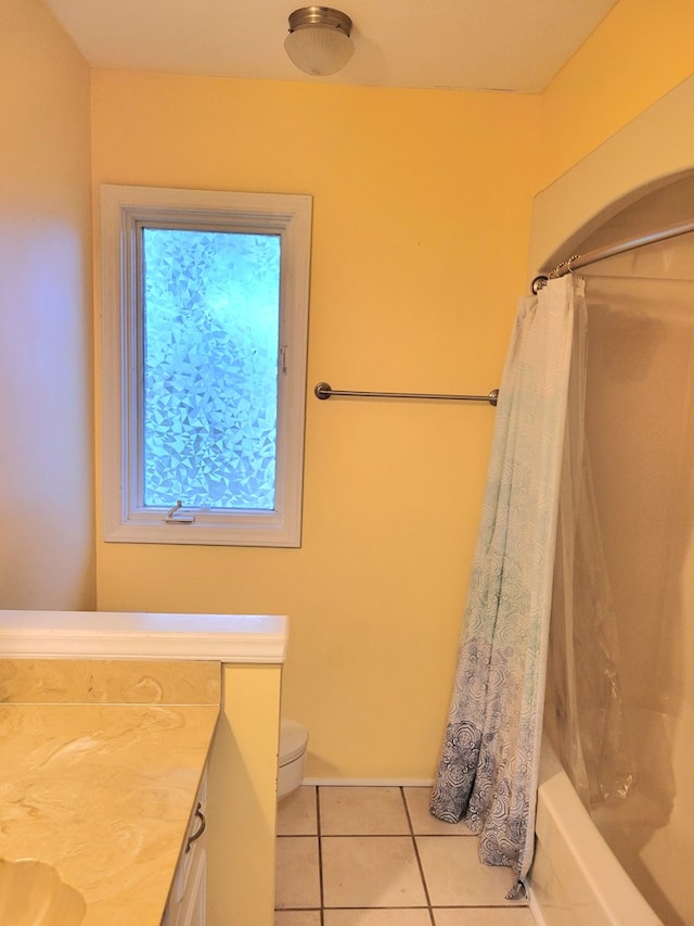 7505 Beaver Run Rd, Midland, GA 31820 - bathroom featuring tile patterned floors, vanity, and shower / tub combo with curtain