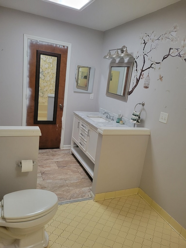 7505 Beaver Run Rd, Midland, GA 31820 - bathroom featuring vanity and toilet
