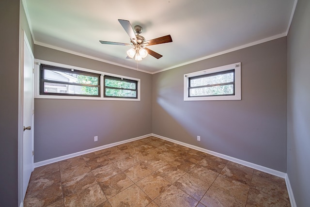 empty room featuring a healthy amount of sunlight and ornamental molding