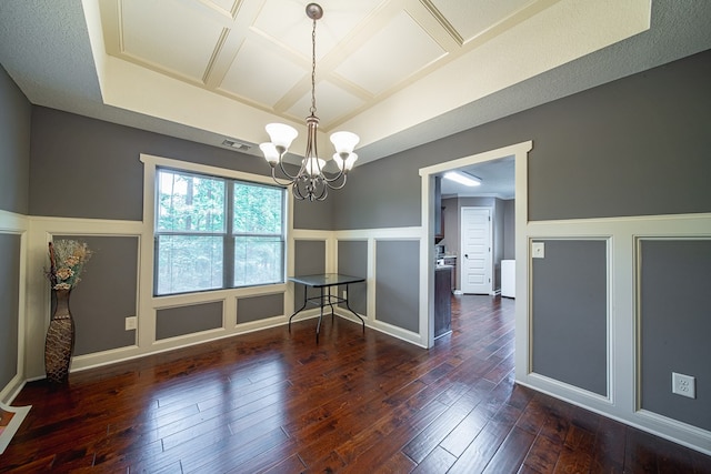 9742 Wooldridge Heights Dr, Fortson, GA 31808 - unfurnished dining area with an inviting chandelier, a decorative wall, dark wood-style floors, and visible vents