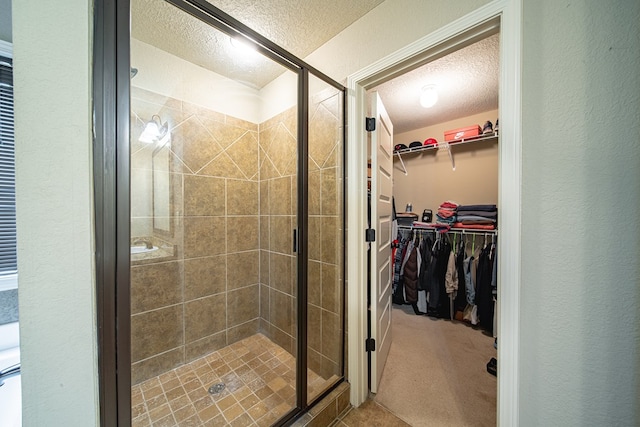 9742 Wooldridge Heights Dr, Fortson, GA 31808 - full bathroom with a textured ceiling and a stall shower
