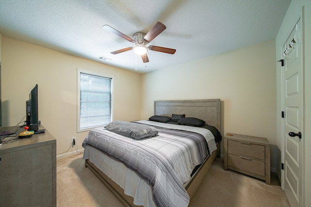 9742 Wooldridge Heights Dr, Fortson, GA 31808 - bedroom with a ceiling fan, a textured ceiling, visible vents, and light carpet